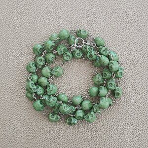 CARVED GREEN SKULL NECKLACE--37"